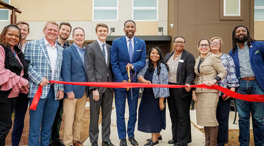 Photo: Atlanta Mayor Andre Dickens, city council members, and financial partners gathered at the ribbon cutting of Residences at Westview, a 60-unit affordable housing community.