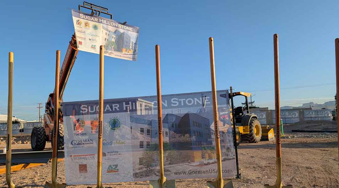 Groundbreaking ceremony signage at the Sugar Hill on Stone affordable housing development in Tucson, Arizona.